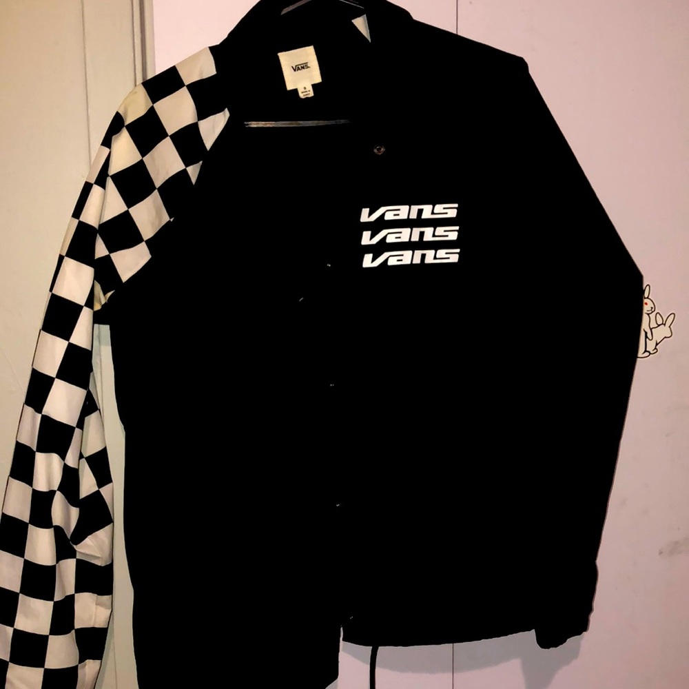 Vans small windbreaker black with one checkered sleeve